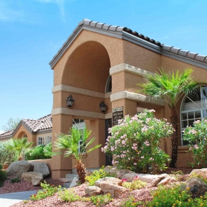 Front office facade at Summit Lake with lush Arizona landscaping